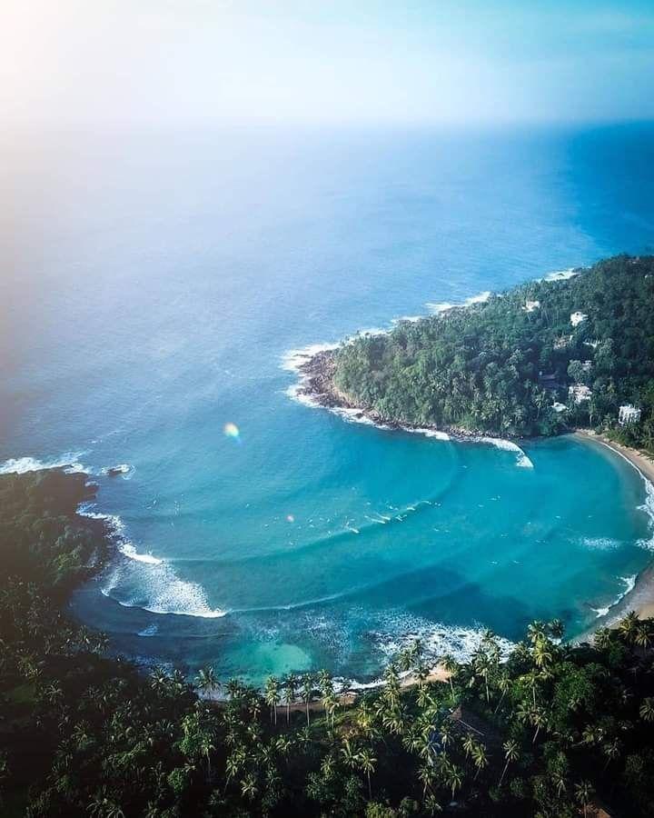 Hotel room with a balcony view of the sea in Hiriketiya